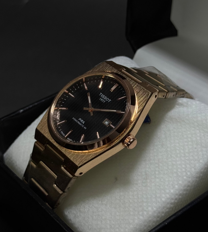 Golden Tissot PRX 1853